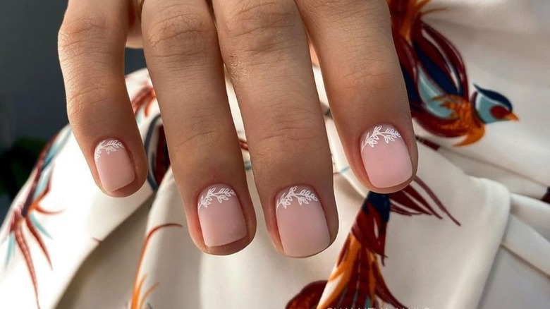 Pink nails with vine cuff art